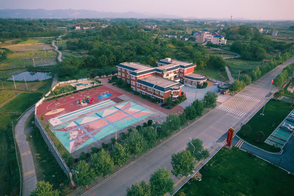 pexels-photo-22764590-22764590 Aerial view of a school and playground in Jiujiang, Jiangxi, China.
